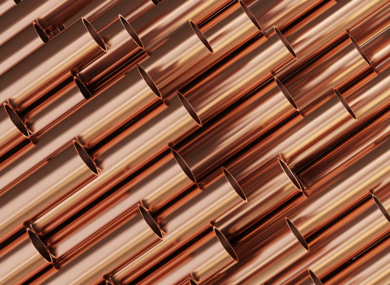 closeup of bronze tubing in cylindrical tube style