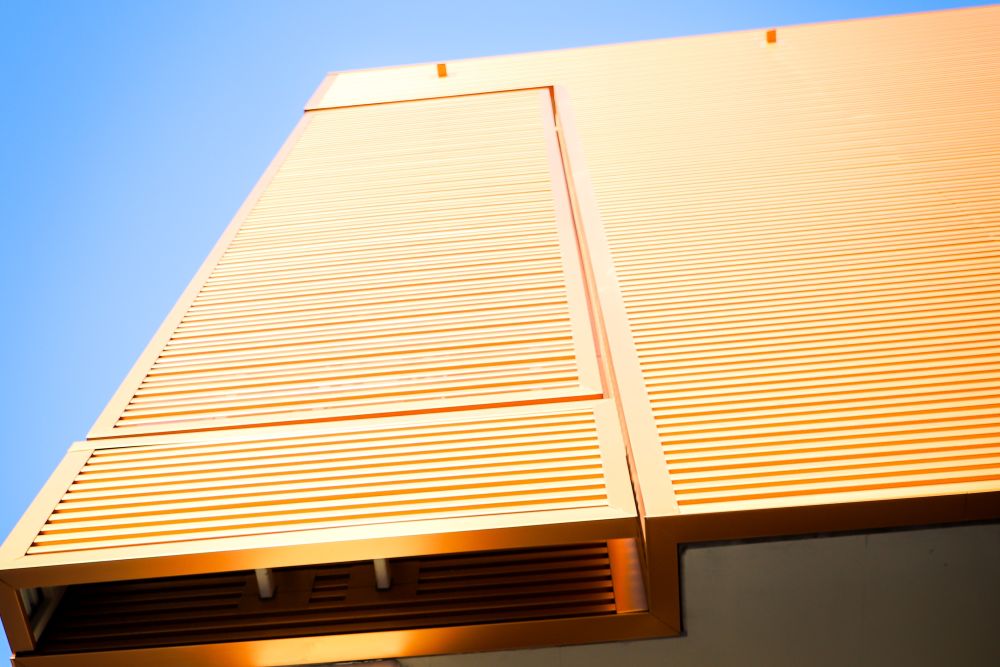 polished brass angle used on the exterior of a building