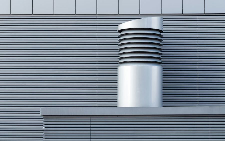 an industrial building with exterior metal wall panels