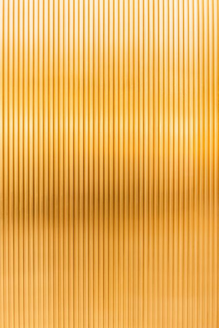 interior or exterior cladding made from polished brass 