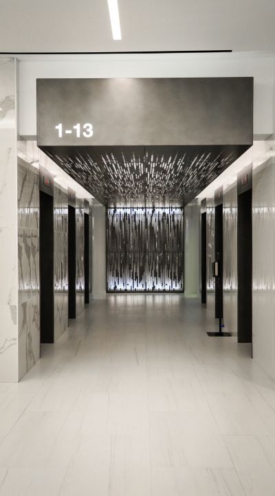 a set of elevators with metal design work