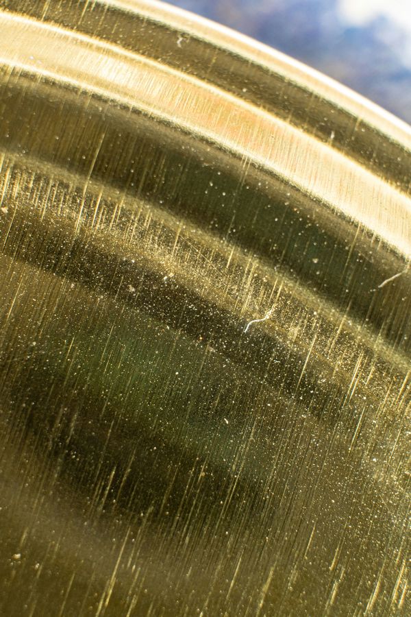 brushed and highly textured brass